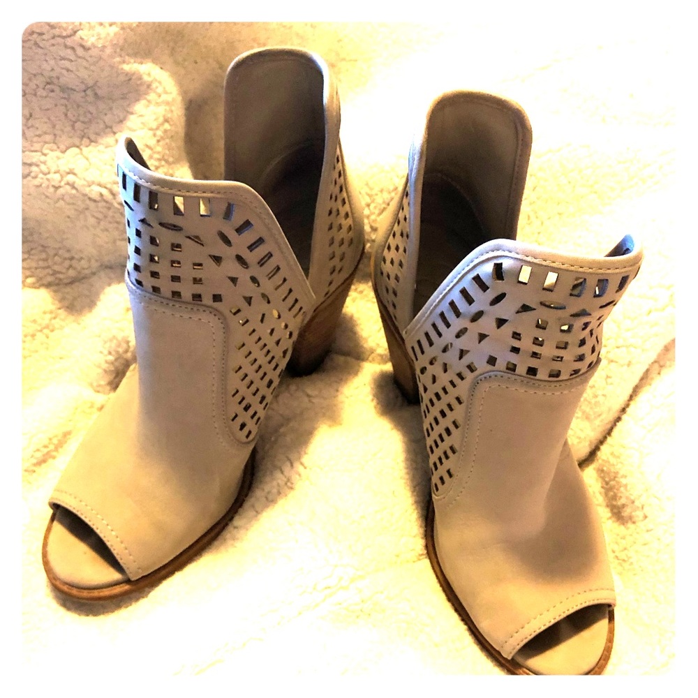 Faux Suede peep toed booties.